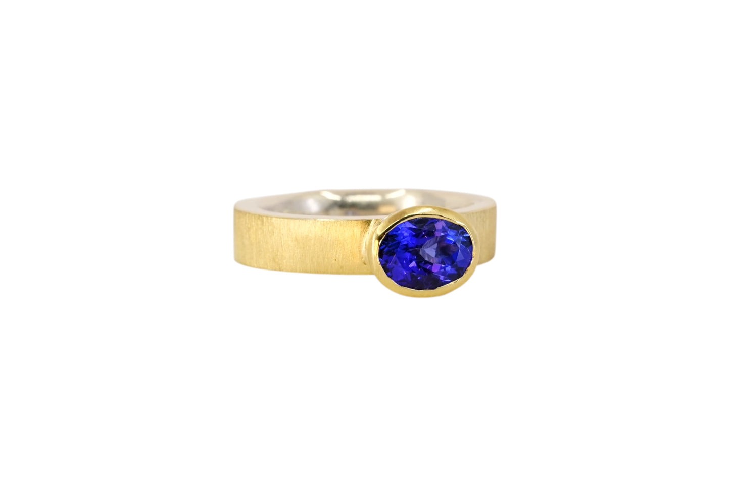 Vibrant Tanzanite Gold Lined Ring