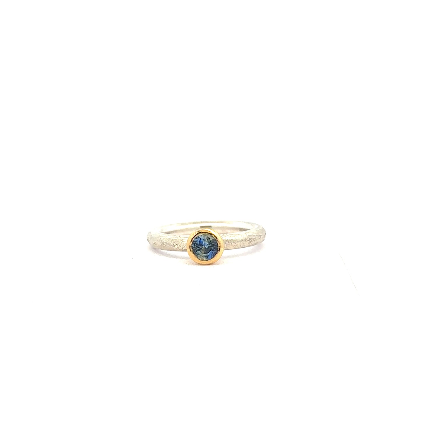 Blue Round Cut Parti Sapphire Ring on a Silver Band