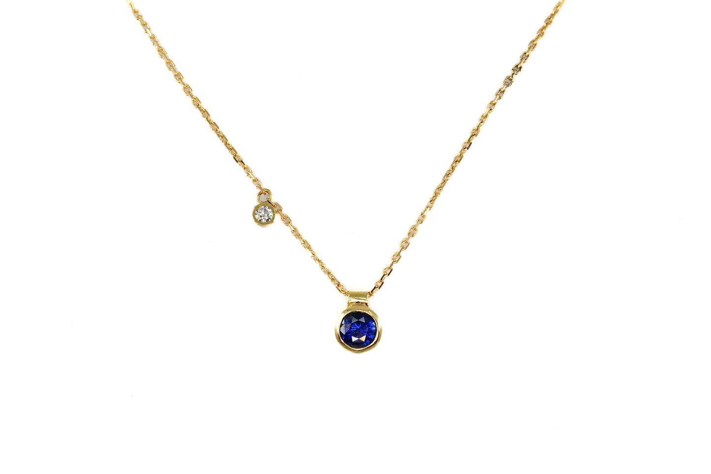 Blue Sapphire and Diamond Asymmetric Pendant