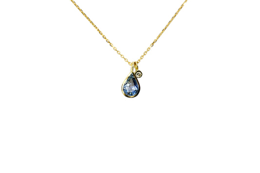 Pear cut blue sapphire and diamond charm necklace