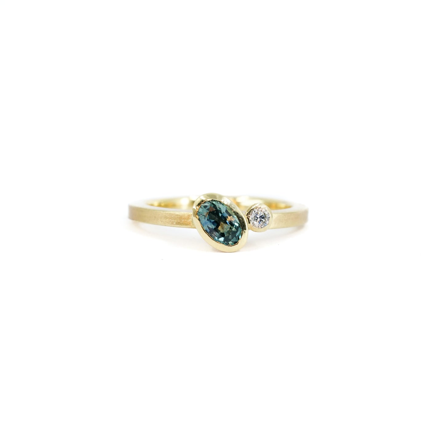 Asymmetric Teal Sapphire and Diamond Ring