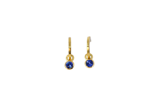 Bright Blue Sapphires on Gold Lined Hoops